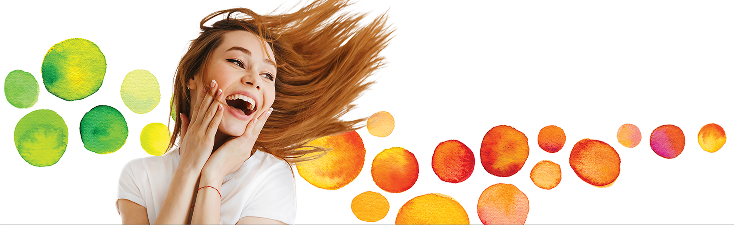 woman jumping and holding up hands to her face while smiling
