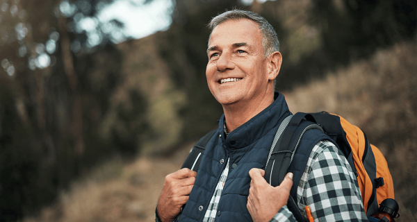 man smiling outdoors